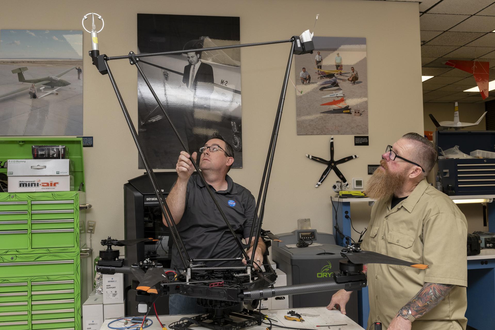 Engineers assembling a research drone in a workshop
